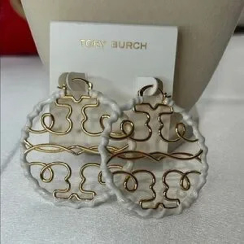 Brand new Tory Burch gold and white earrings